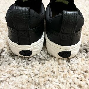 Cariuma Black Quilt Slip Ons